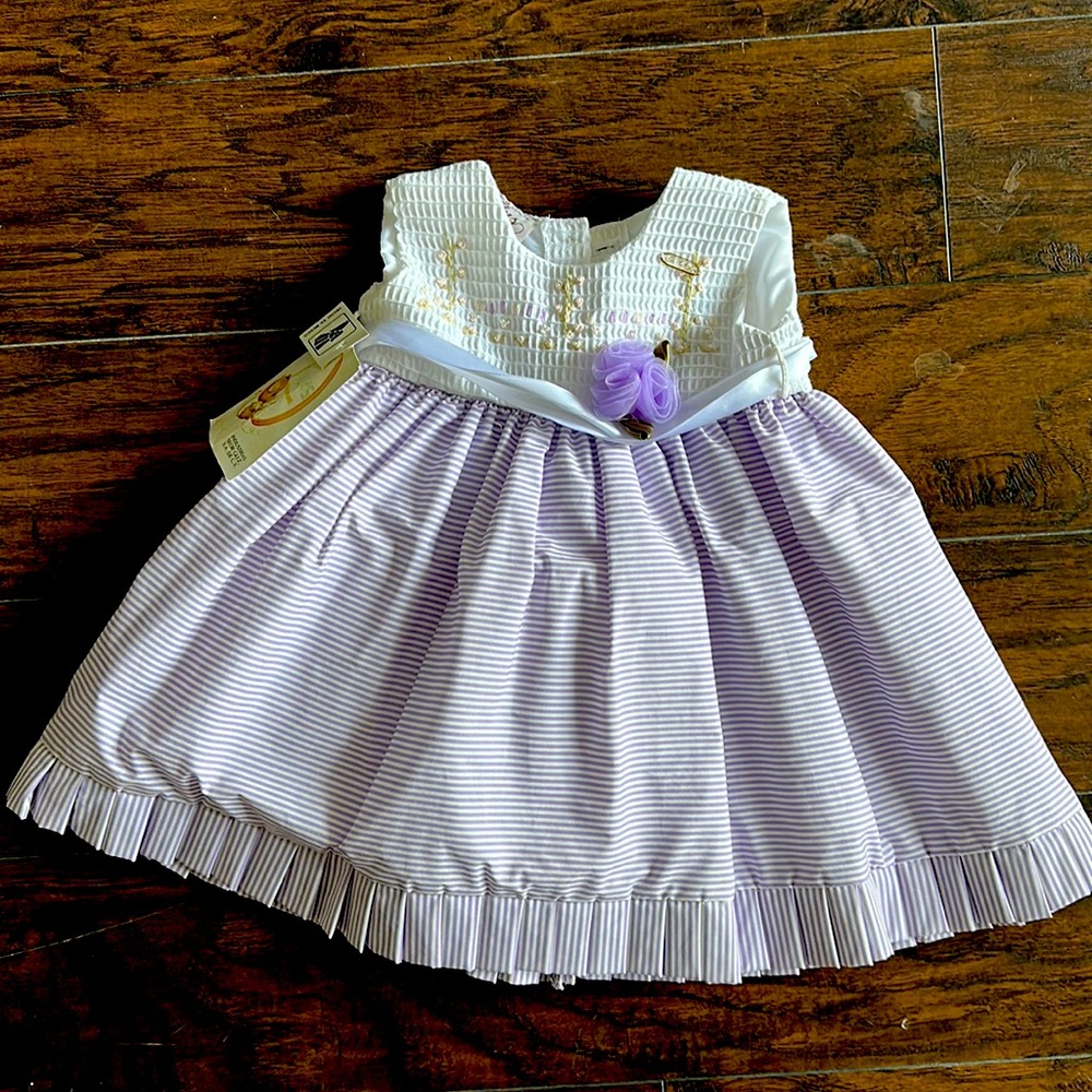 NWT girls dress. Size 18M